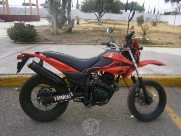 Moto roja en venta o cambio -11