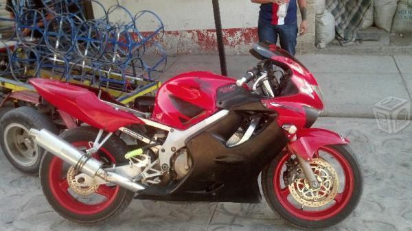 exelente moto posible cambio -99