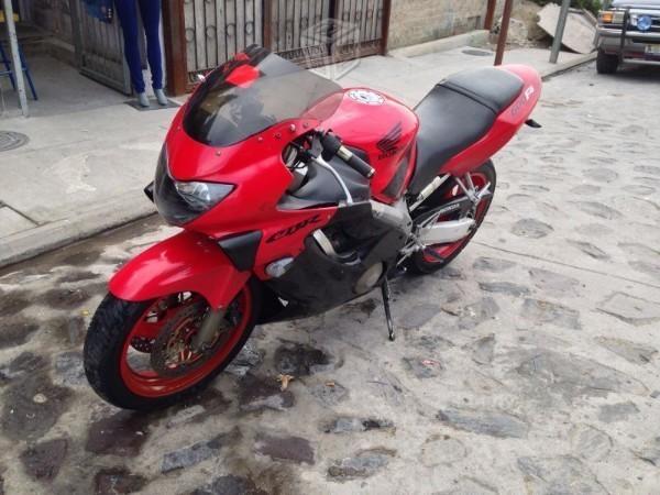 exelente moto posible cambio -99