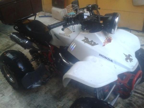 Cuatrimoto honda 200 four trax cambio -94