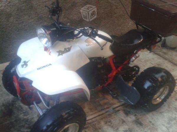 Cuatrimoto honda 200 four trax cambio -94