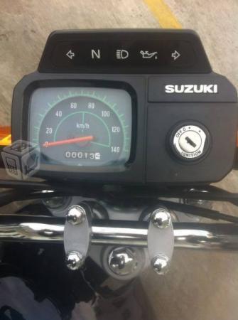 Suzuki Ax 100 -16