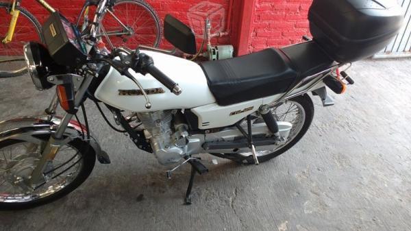 Motocicleta Honda 125 como nueva -13