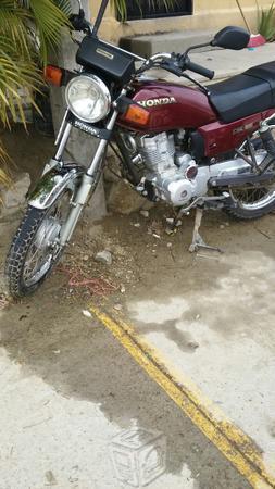 Vendo moto Honda -14