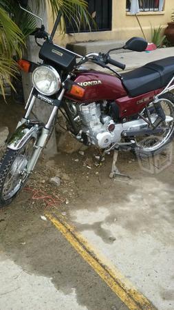 Vendo moto Honda -14