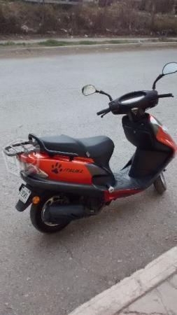 Bonita motoneta italika 125 cc -14