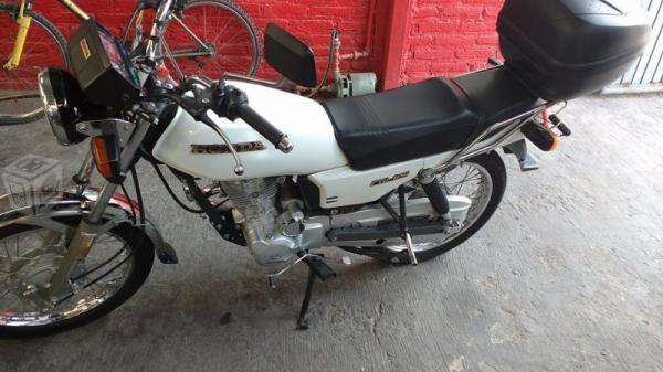 Motocicleta Honda 125 como nueva -13