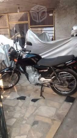 Honda titan 150cc con todo pagado -05