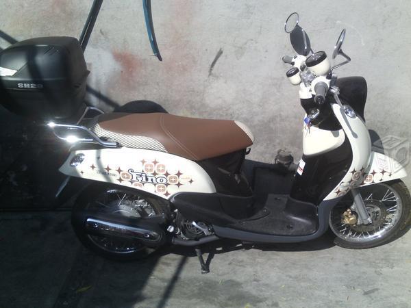 Vendo motocicleta yamaha fino -13