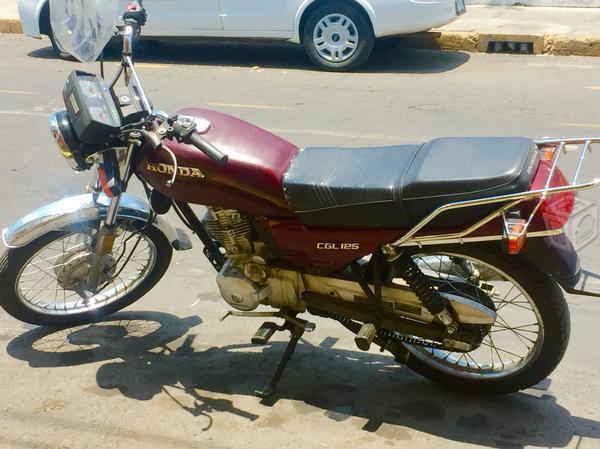 Moto de trabajo Honda por auto y efectivo -12