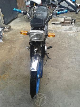 Motocicleta Suzuki ax100 -15