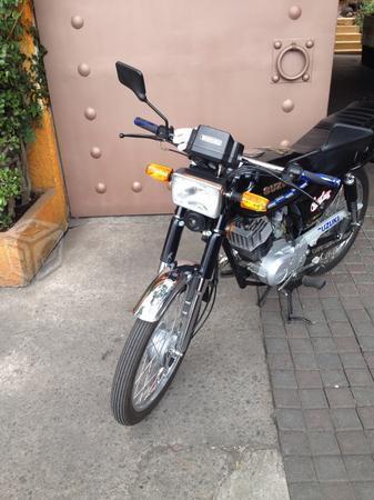 Motocicleta susuki ax100 -15