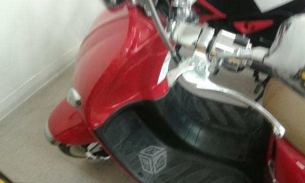 Motocicleta vitalia R semi nueva -15