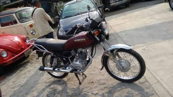 Moto honda 125 con llatas nuevas excelen -14