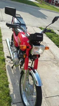 Suzuki ax100 como nueva -16